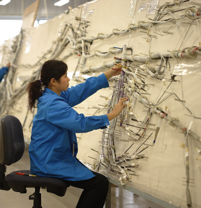 Employee working at Fokker. 