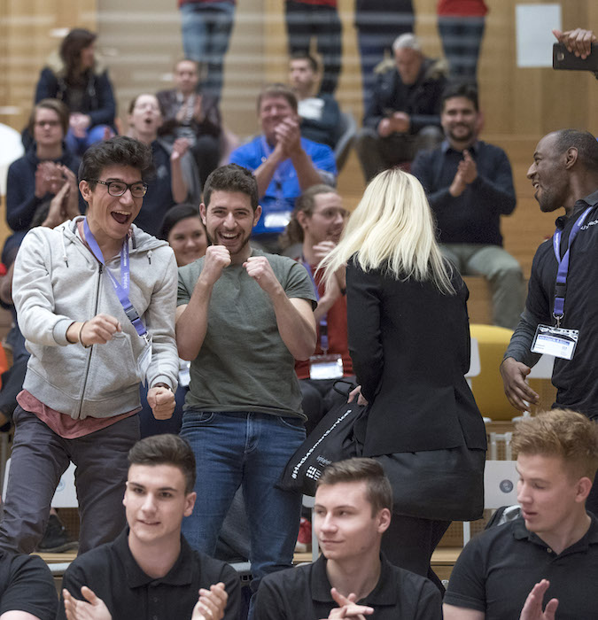 Cheering audience. 