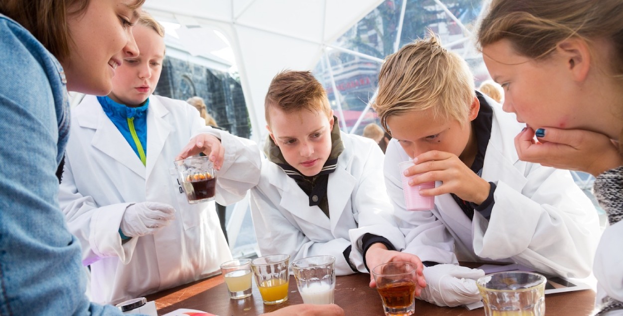 Children working on a science project for school. 