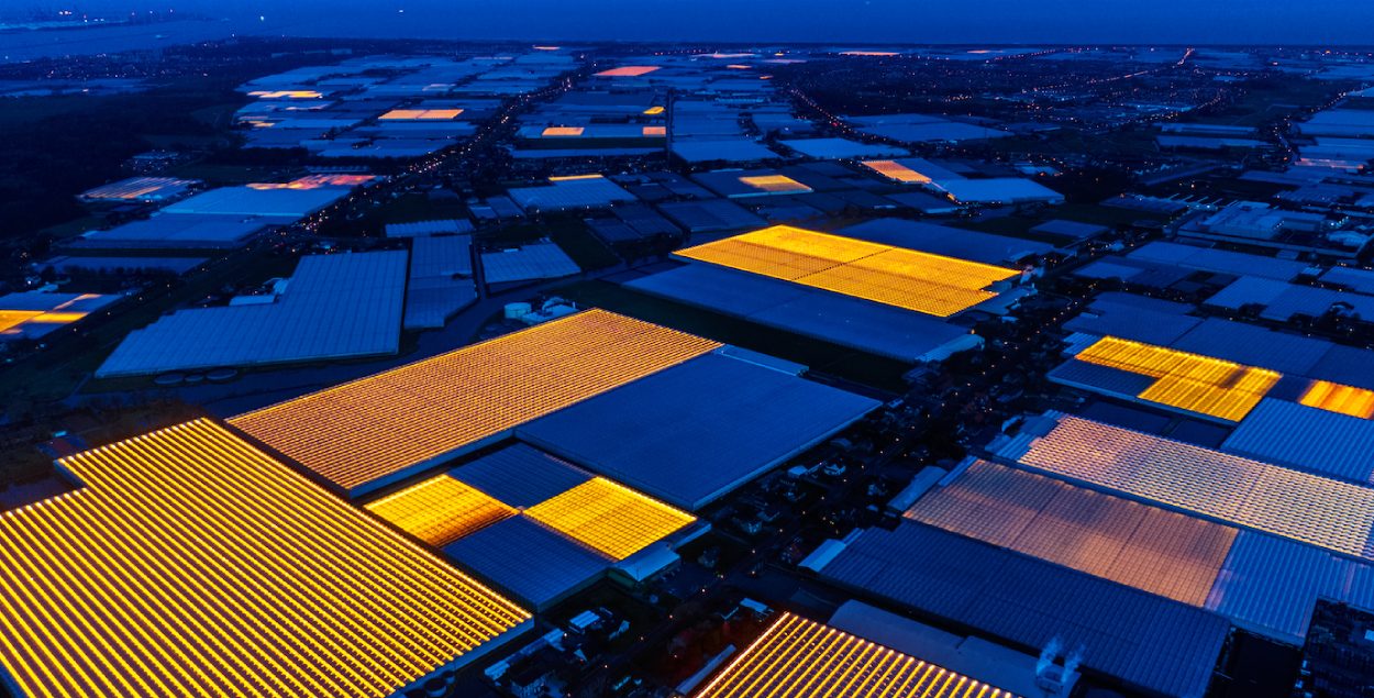 Picture by night of Dutch greenhouses