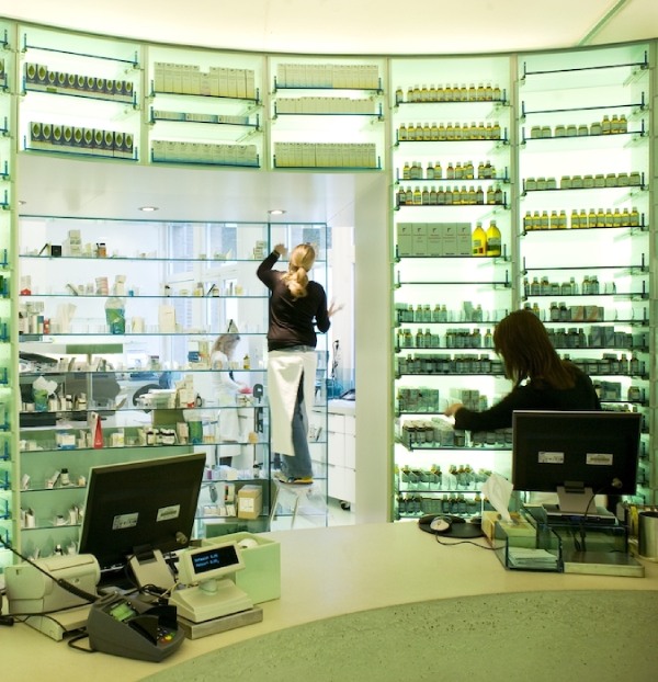 Two women working at the pharmacy. 