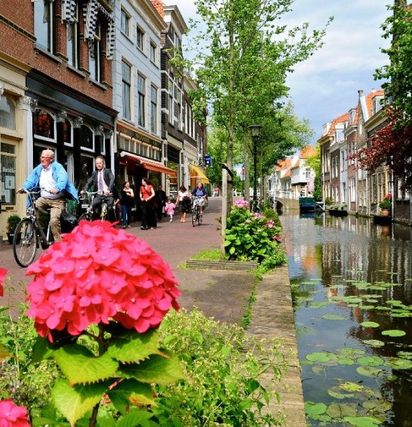 Houses at a canal in city center of Delft. 