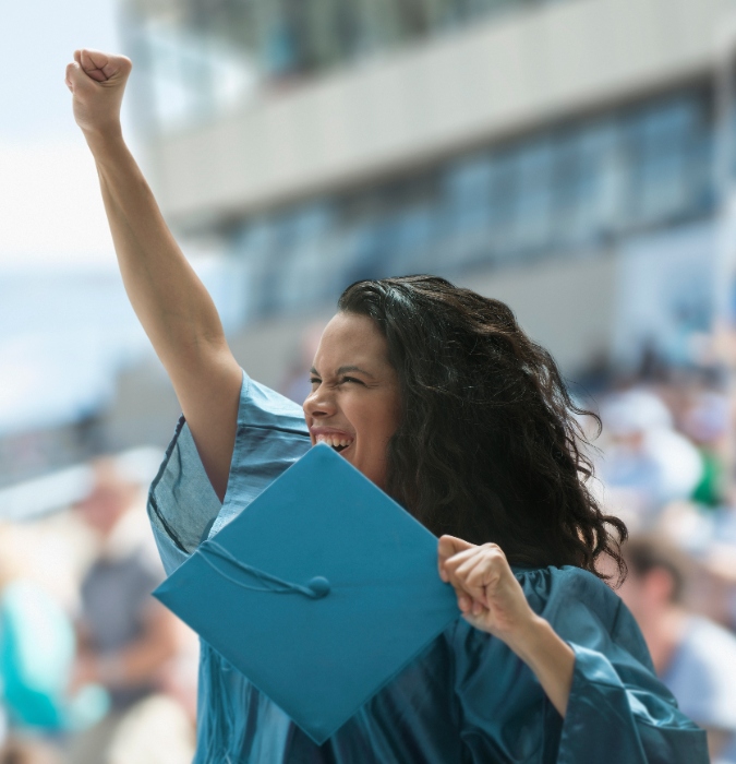 Happy women because she graduated. 