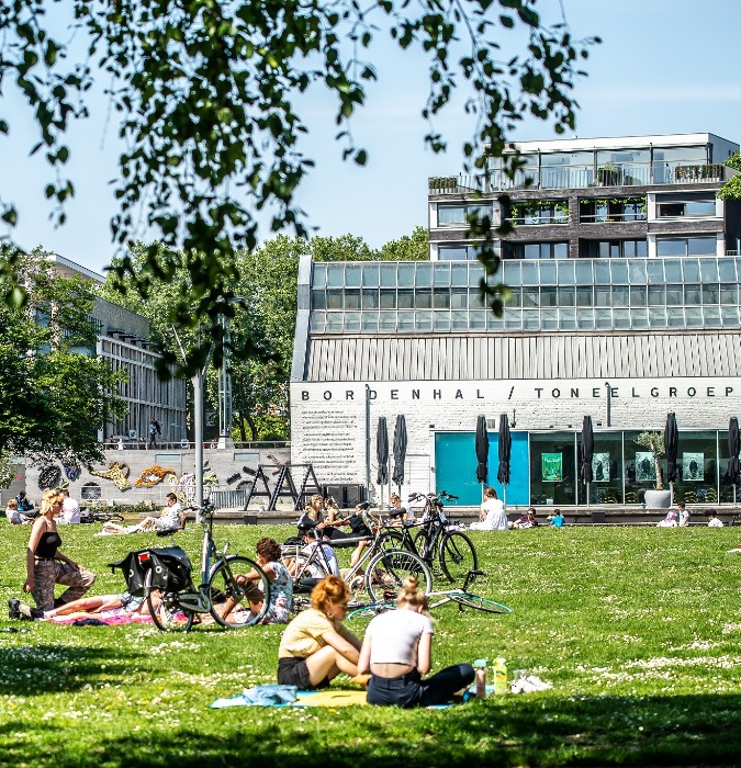 Students at the park on a sunny day