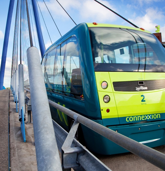 electric bus from connection crossing a bridge